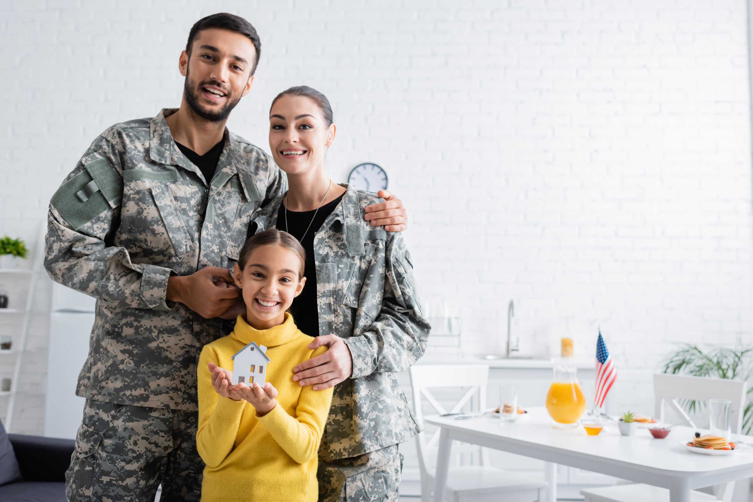 Military family saving with VA IRRRL streamline refinance