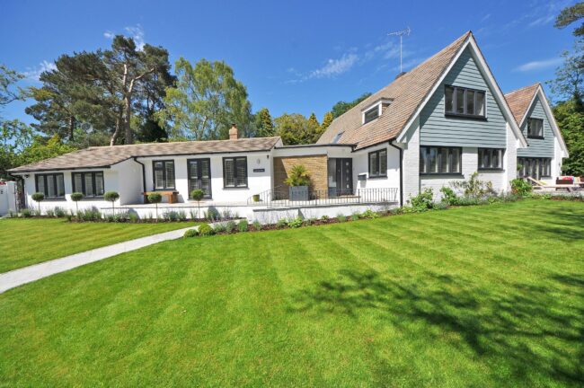 Suburban Cape Cod-style home with green lawn — typical Maryland suburban dwelling