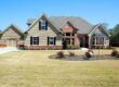 Suburban ranch-style home in South Carolina with manicured lawn