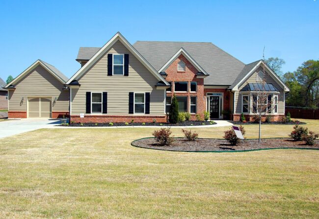 Suburban ranch-style home in South Carolina with manicured lawn