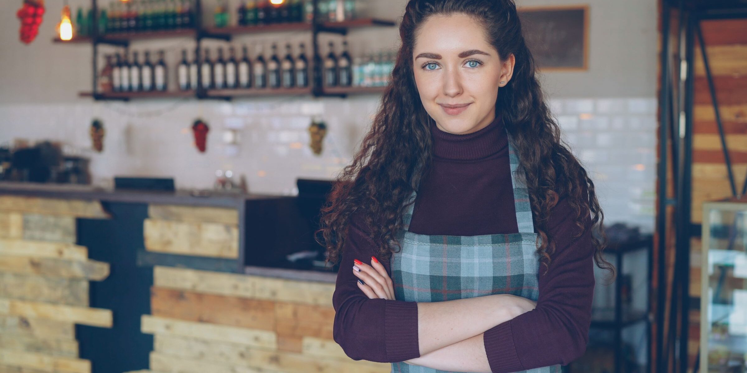 Virginia small business owner – bank statement loans hero Virginia confident small business owner in her shop