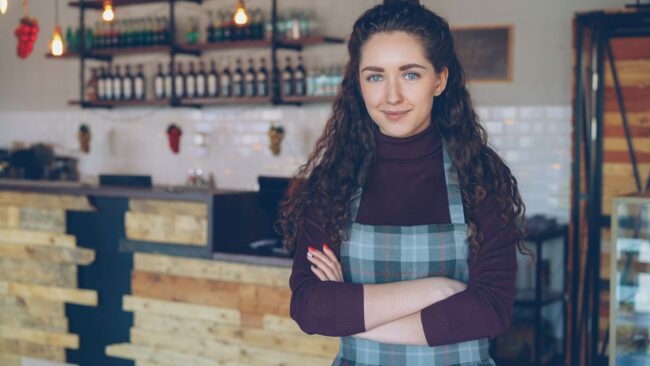Virginia confident small business owner in her shop
